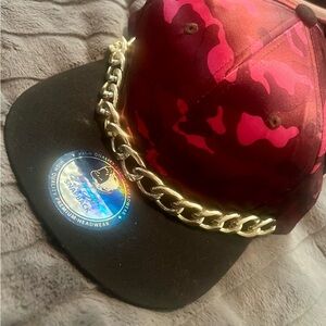 Stylish Red and Black Snapback Hat with Gold Chain